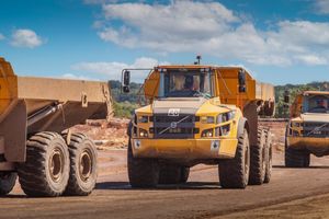 SER articulated dumptruck operators driving Volvo machines across a construction site.