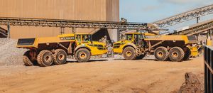 Two Volvo A45G articulated dump trucks parked up facing each other