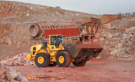 A Volvo L180G wheeled loading shovel at work in a quarry