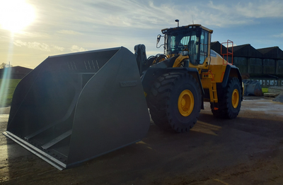 A Volvo L220H loading shovel equipped with an 11m3 high tip bucket.